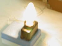 Свечение лампы 220В, 25Втв однопроводной линии передачи при повышенном напряжении от источника